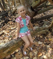 small girl in shorts